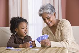 Nice grandma plays Go Fish with a smile. I don't think I'll be permitted to play cards with my grandchildren. Ever.
